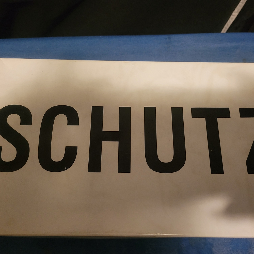 SCHUTZ Brand Logo Display Sign